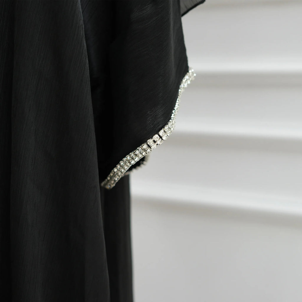 Abaya moderne fluide style Dubai chic